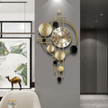 Sculptural Gold Orbit Wall Clock | Ormexis