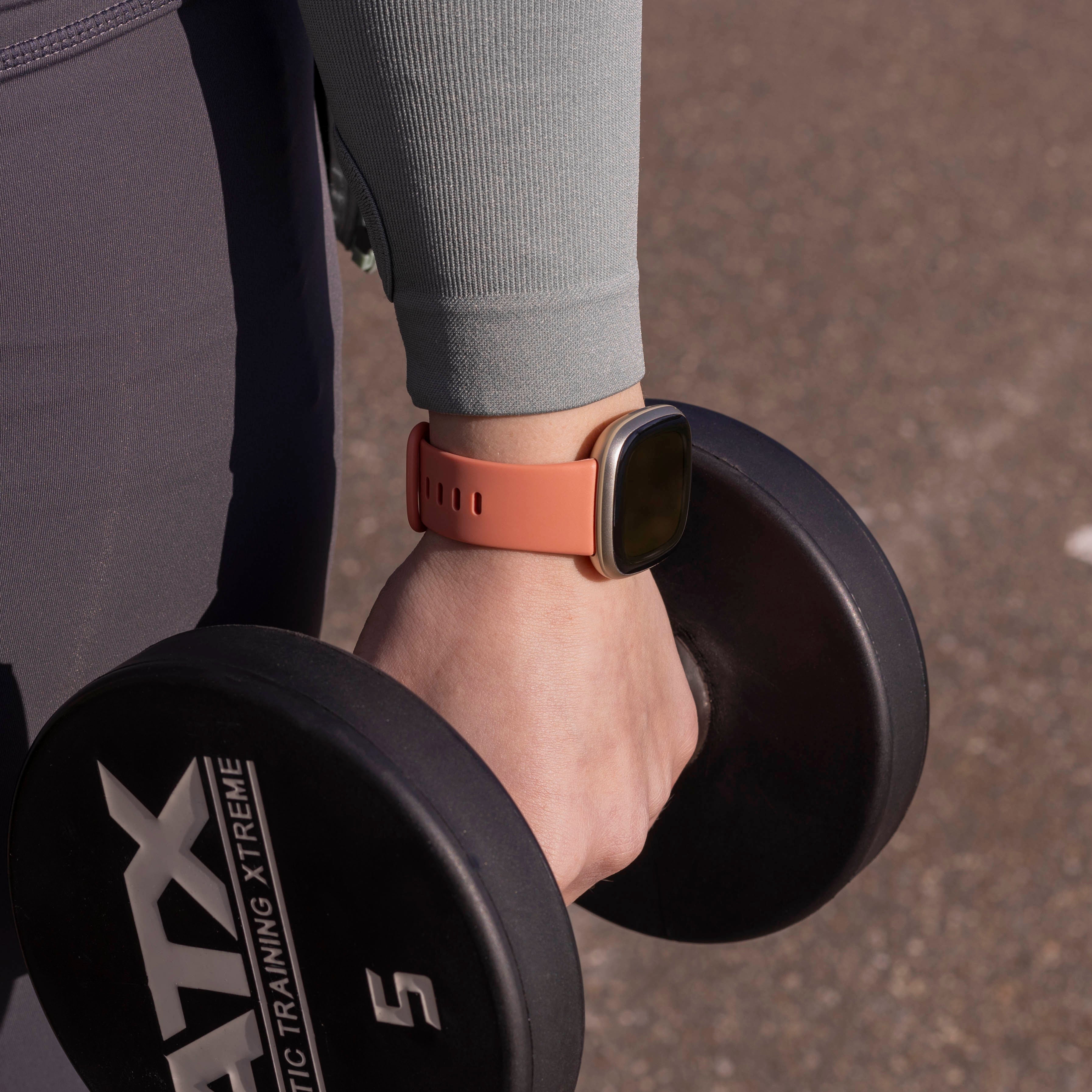 Original pink silikoneudskiftningsrem til Fitbit Versa 3