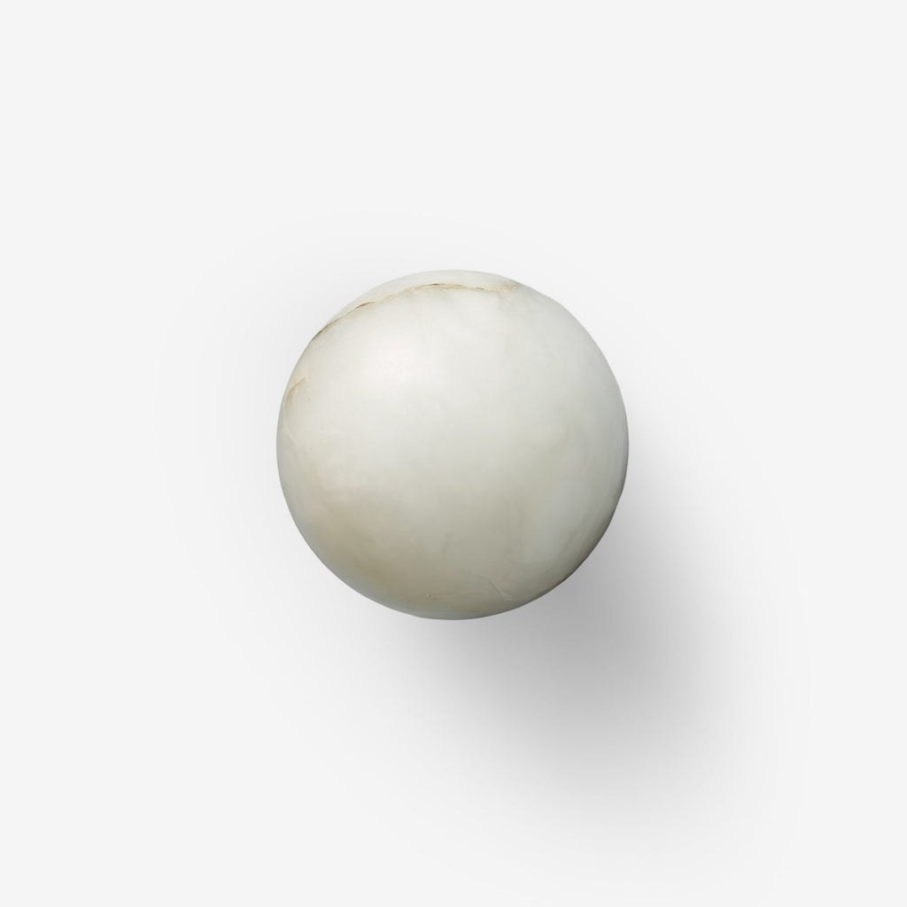 Alabaster Orb Wall Light With Gentle Glow In Minimalist Design - Ormexis