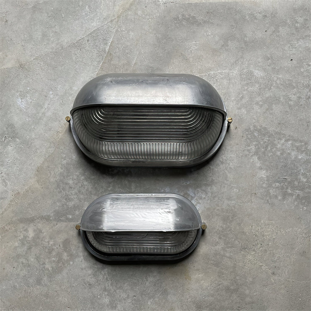 Przemysłowa lampa ścienna typu bulkhead | Ormexis