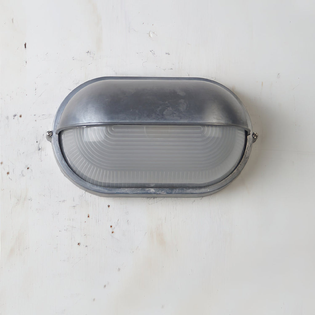 Przemysłowa lampa ścienna typu bulkhead | Ormexis