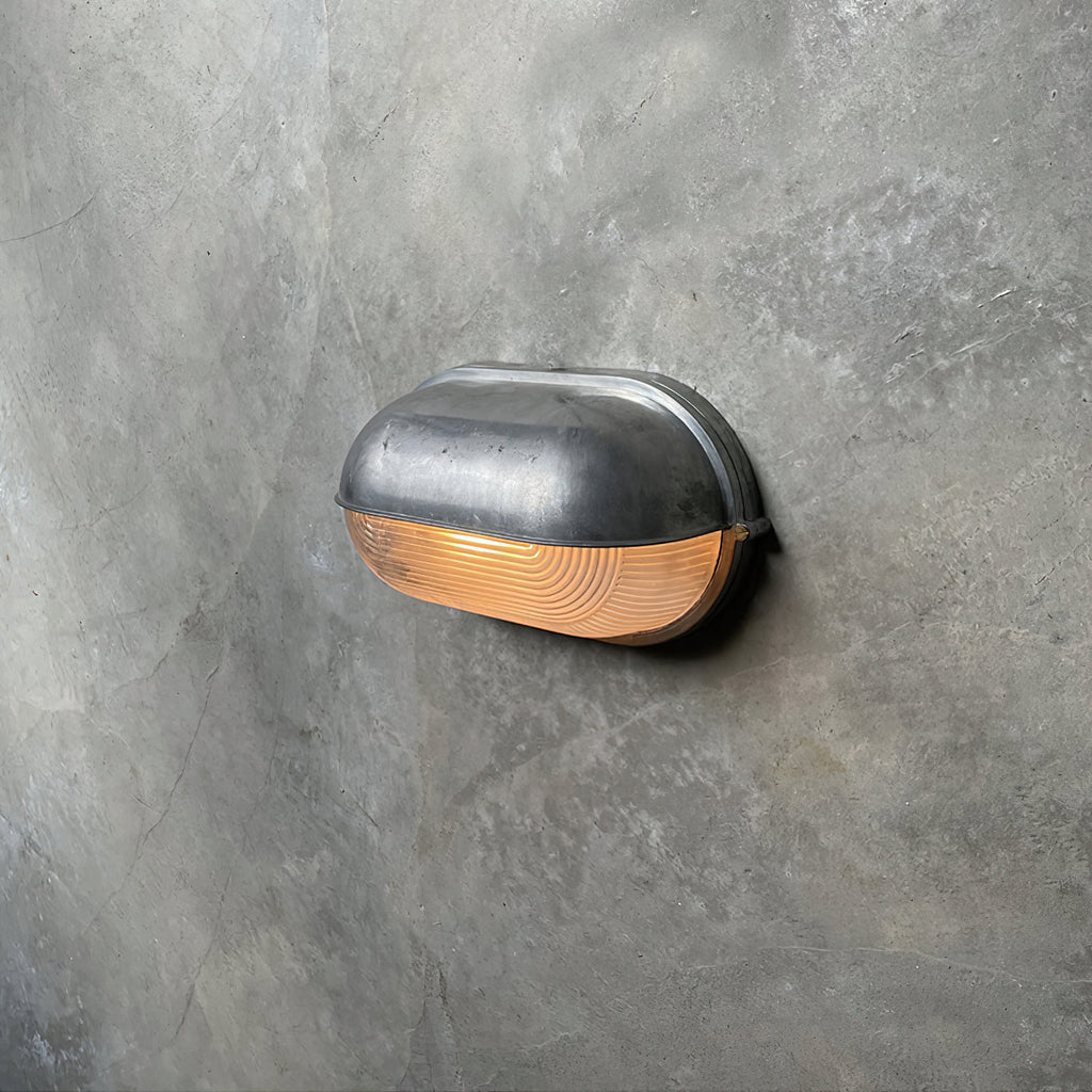 Przemysłowa lampa ścienna typu bulkhead | Ormexis