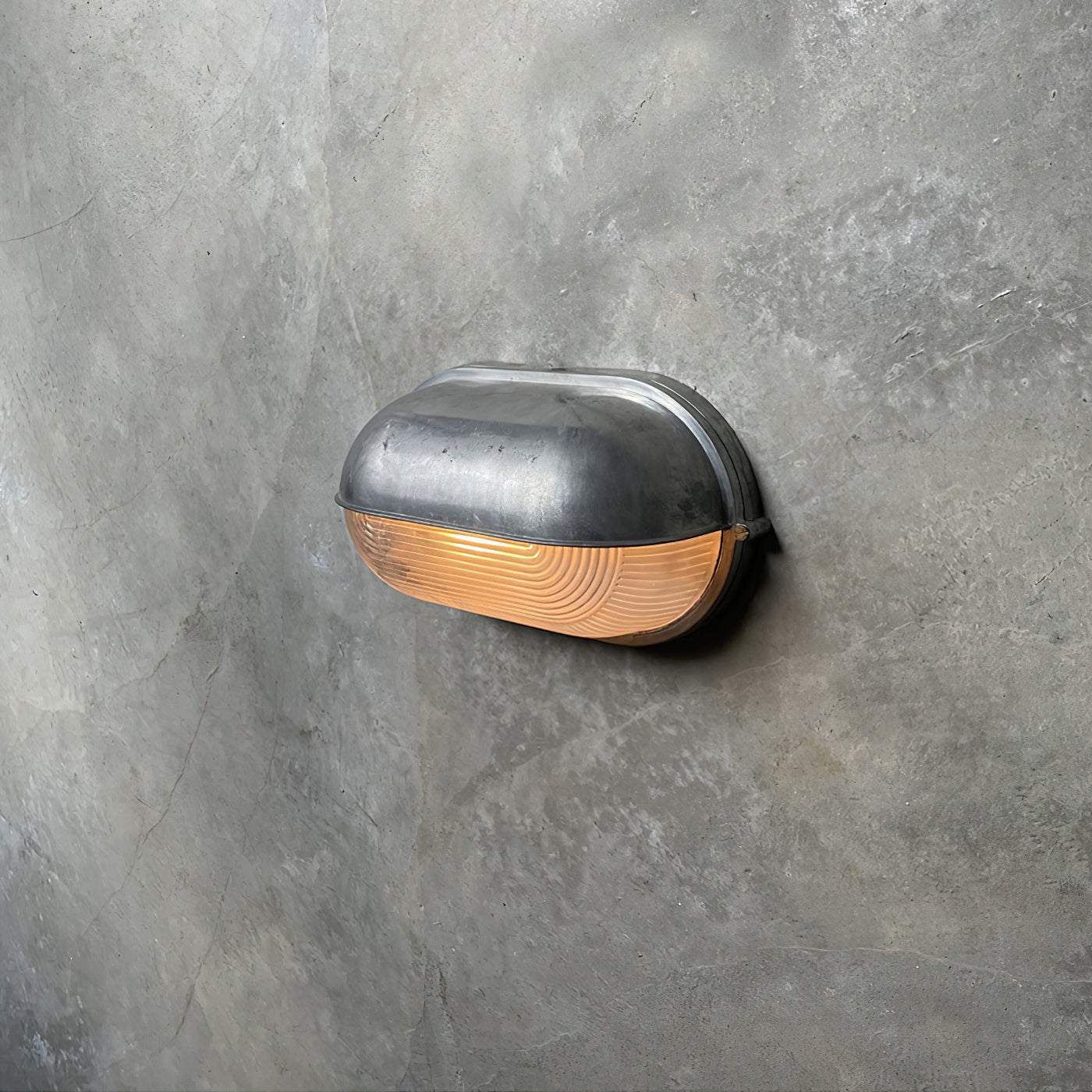 Przemysłowa lampa ścienna typu bulkhead | Ormexis