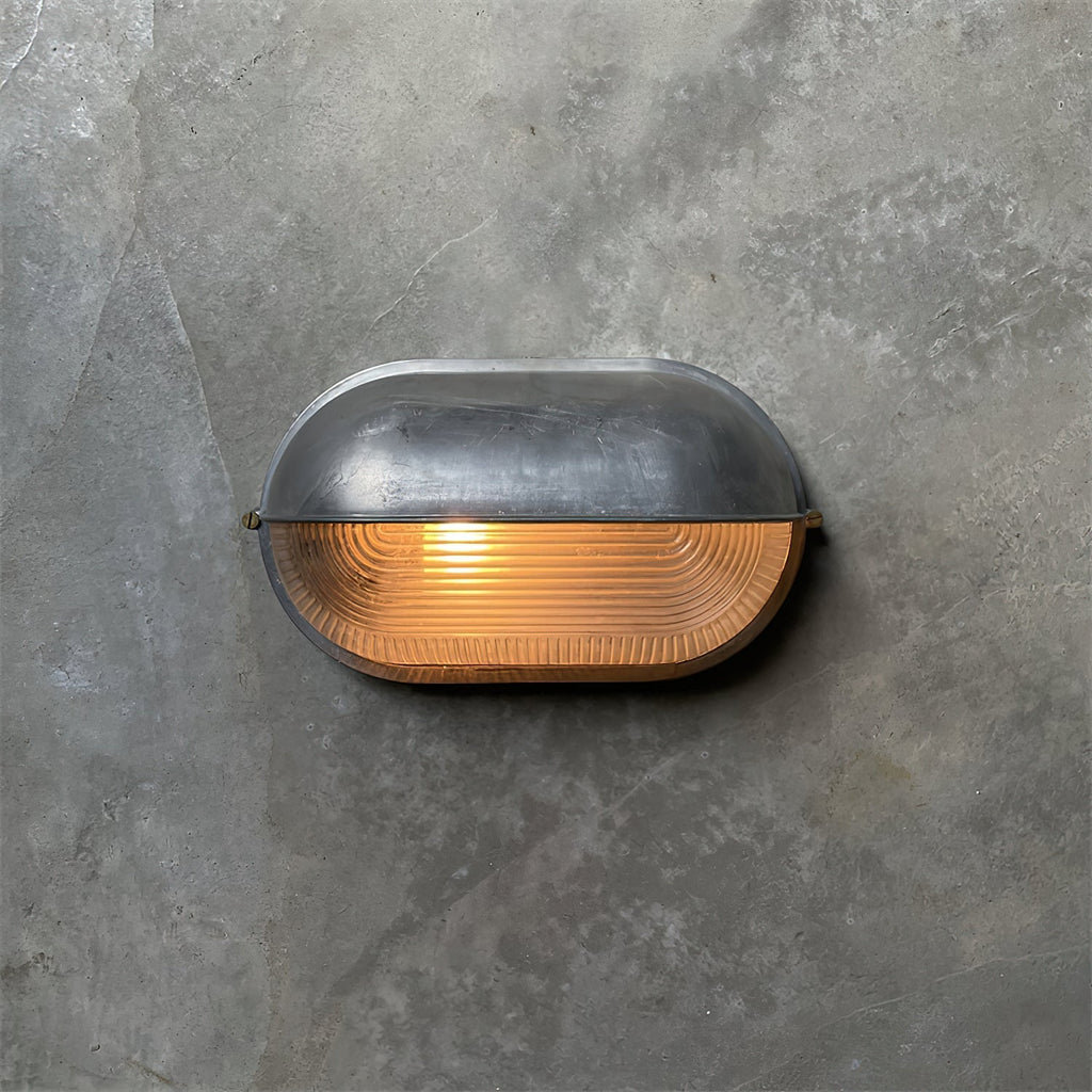 Przemysłowa lampa ścienna typu bulkhead | Ormexis