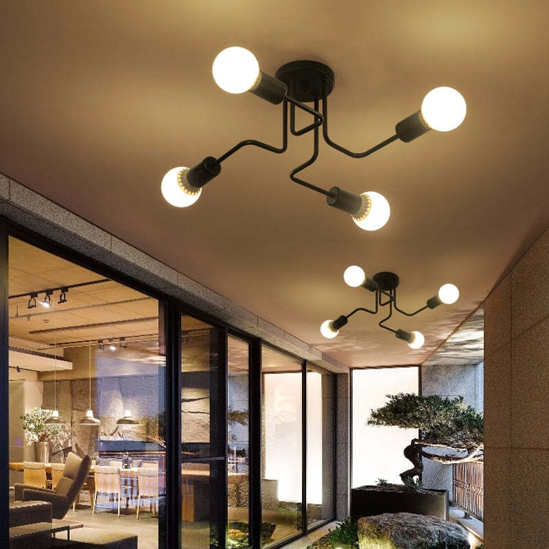 Schwarze Sputnik-Deckenleuchte aus Metall im Industrie- und Mid-Century-Stil mit mehreren Armen und sichtbaren Glühbirnen, flache Deckenmontage | Ormexis