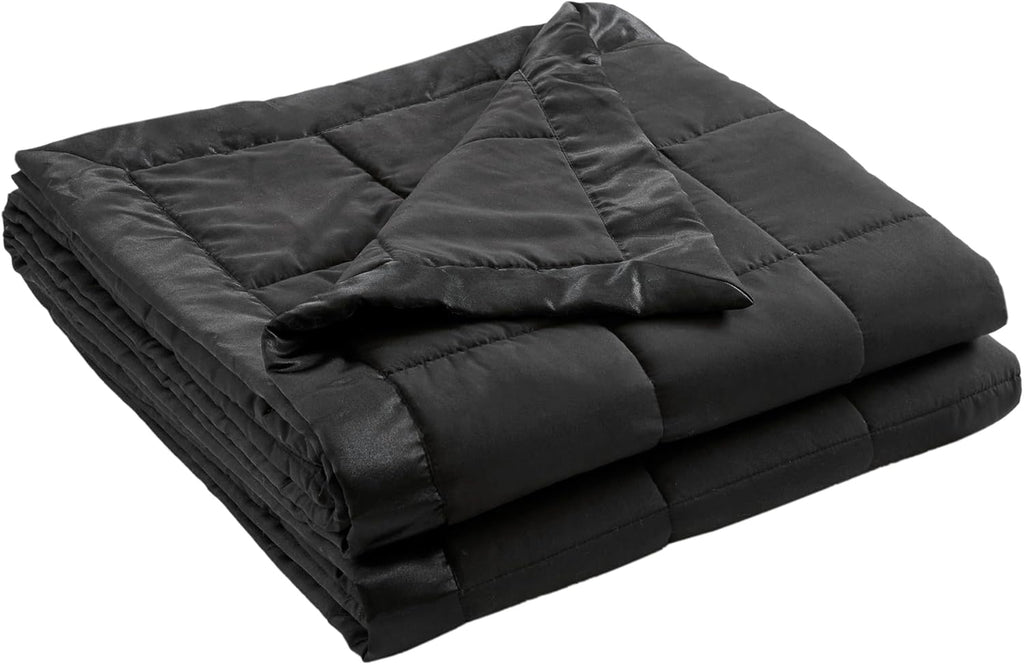 Coperta leggera morbida della collezione Windom con bordo in raso