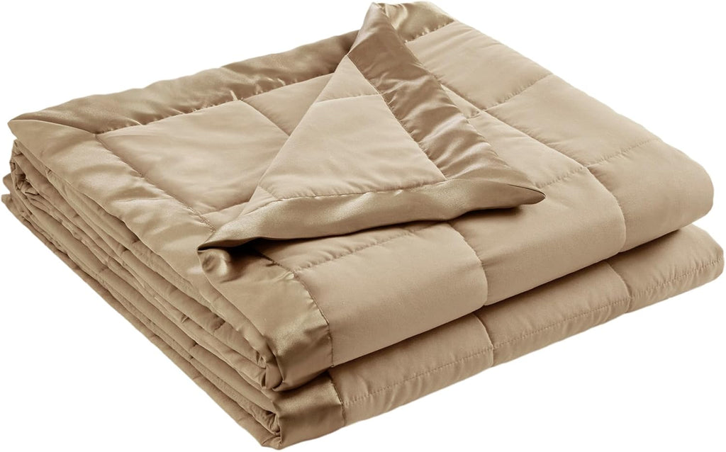Coperta leggera morbida della collezione Windom con bordo in raso