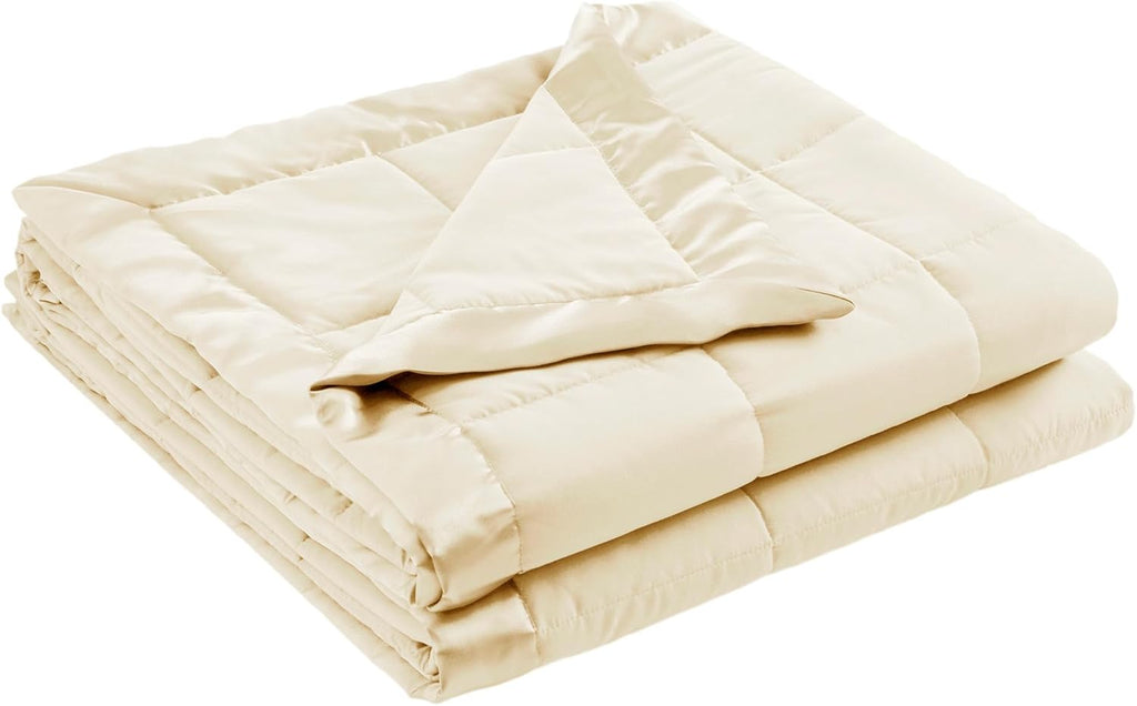 Coperta leggera morbida della collezione Windom con bordo in raso