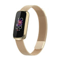 Fitbit Luxe Milanese-armband med guldfinish Champagne