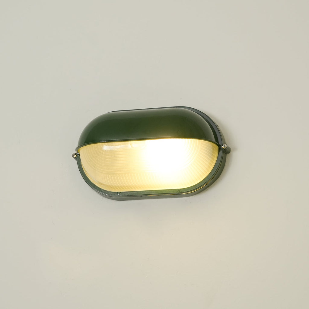 Oval udendørs væglampe i ribbet glas, sort, industriel bulkhead | Ormexis