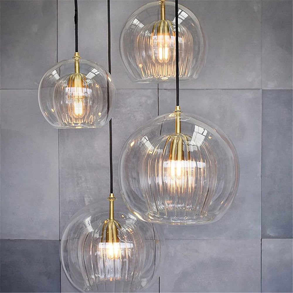 Gerippte Glas-Pendelleuchte mit Metallfassung, klar und bernsteinfarben | Ormexis