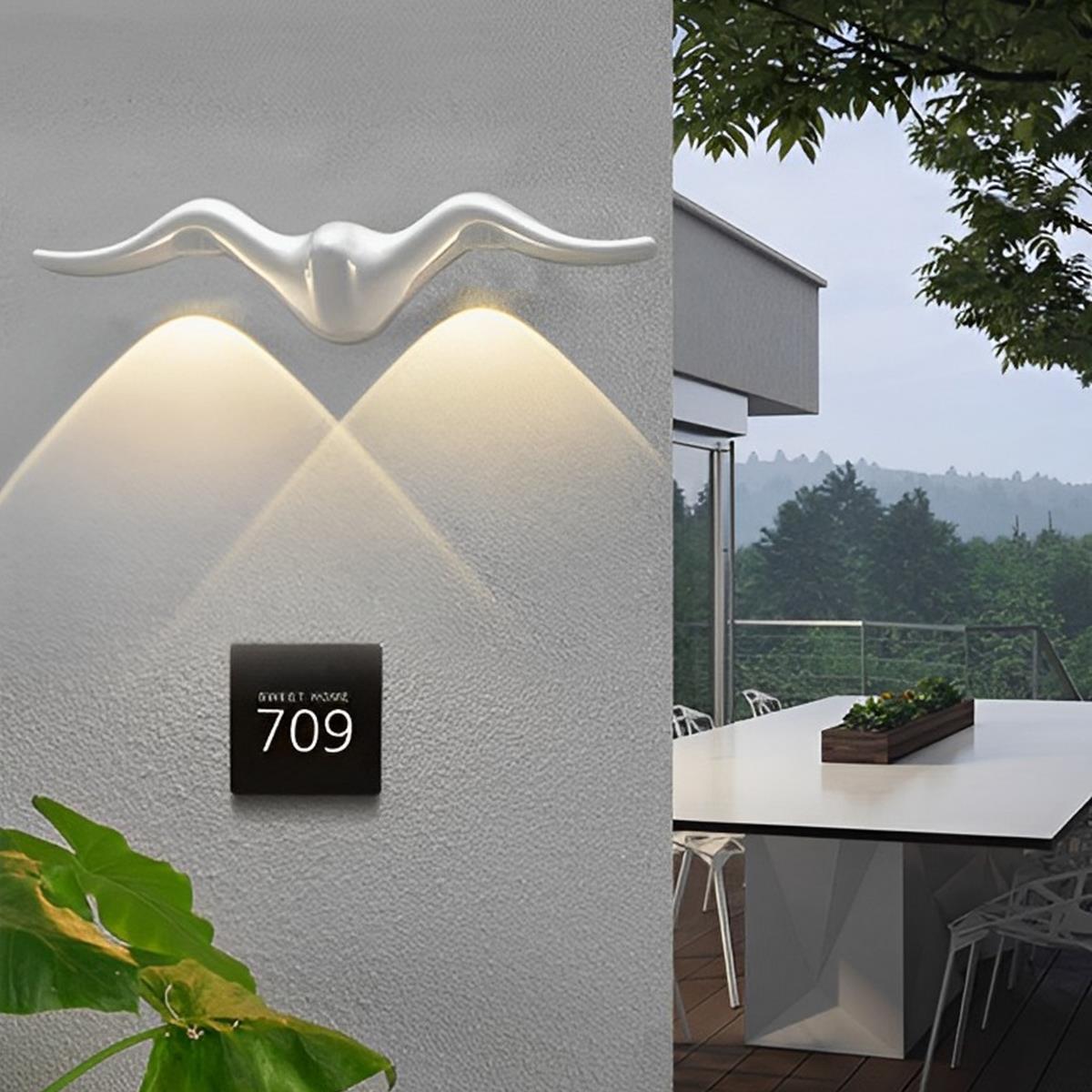 Lámpara de pared LED impermeable para exteriores con silueta de animal esculpida Aurelia | Ormexis