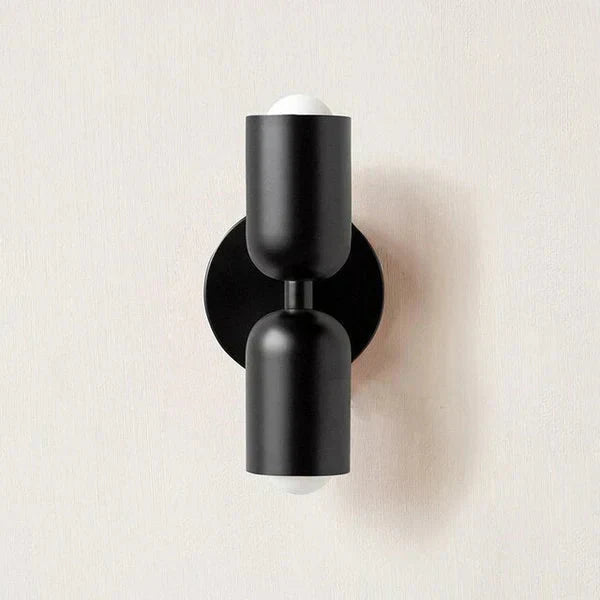 Aplique de parede cilíndrico em metal branco e preto, com duas luzes, para cabeceira | Ormexis
